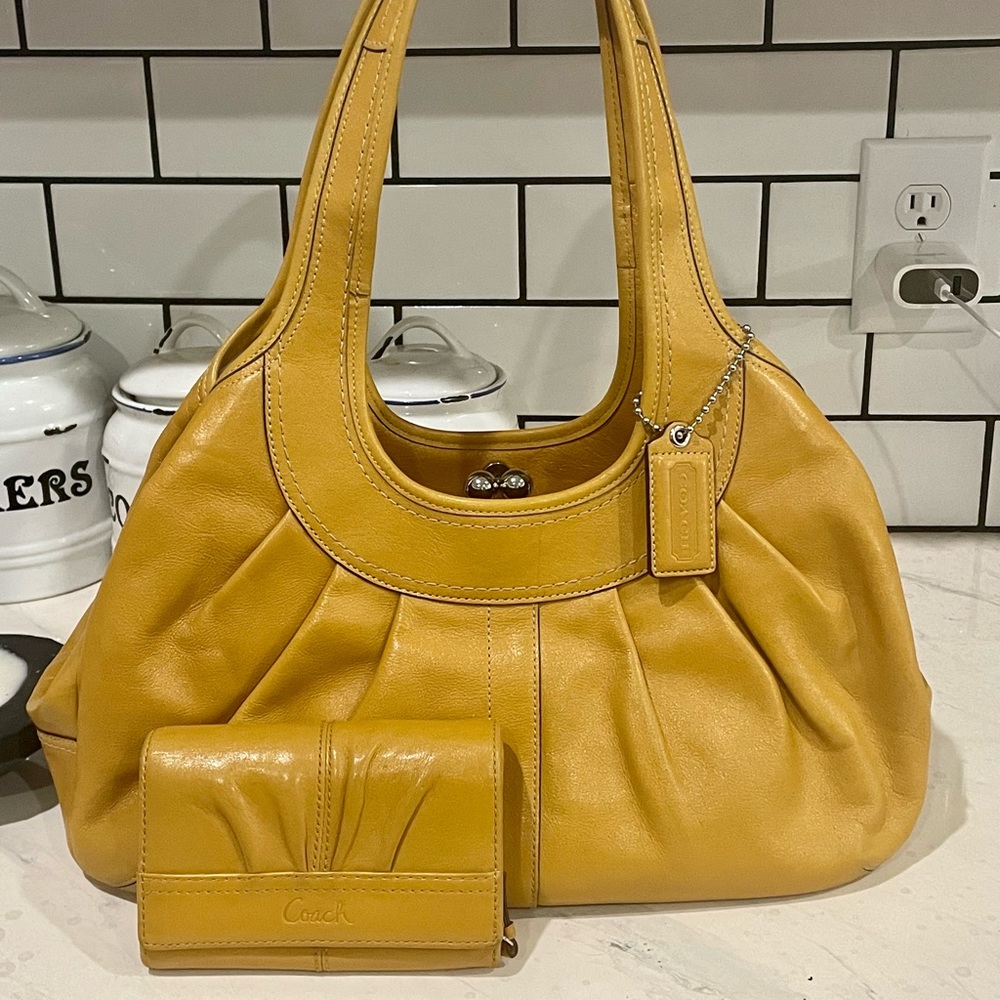 COACH Ergo Kisslock Frame Satchel and matching Coach wallet.